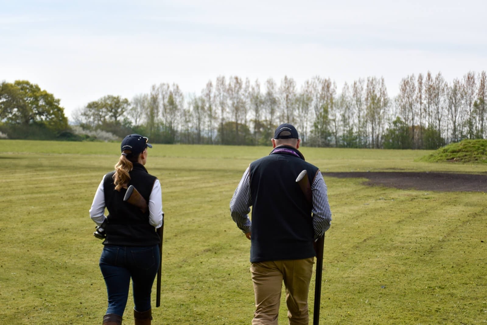 A pair of shooters walking the grounds at Lady's Wood Shooting School