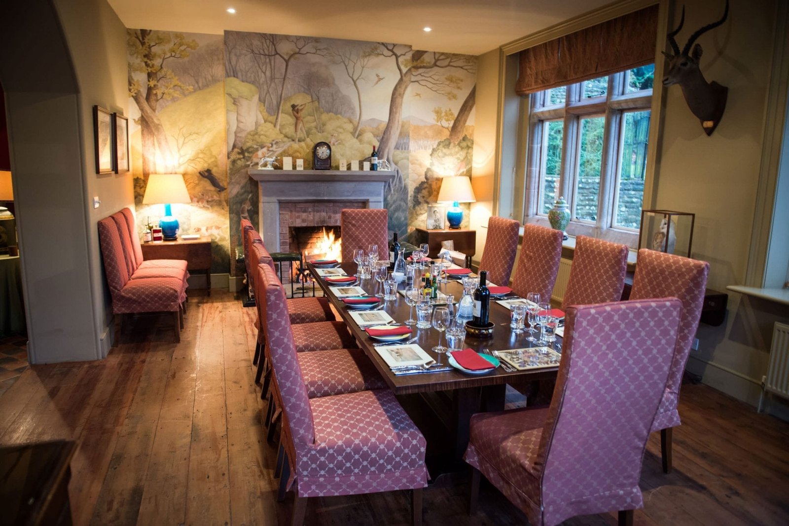 The dining room at Perrystone Estate as part of Warm fire and sofas organised as part of Lady's Wood Shooting School sporting agency