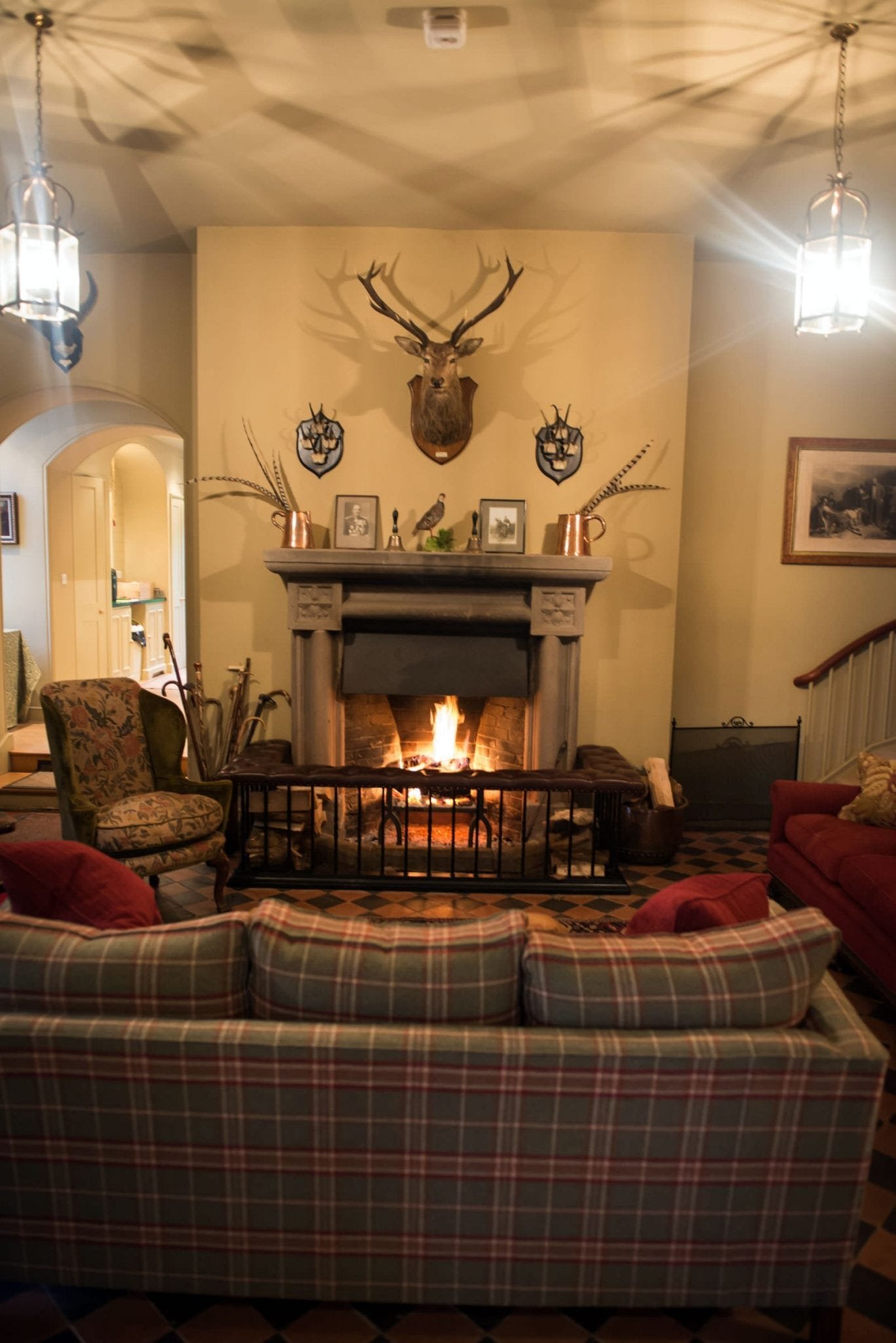 Warm fire and sofas organised as part of Lady's Wood Shooting School sporting agency