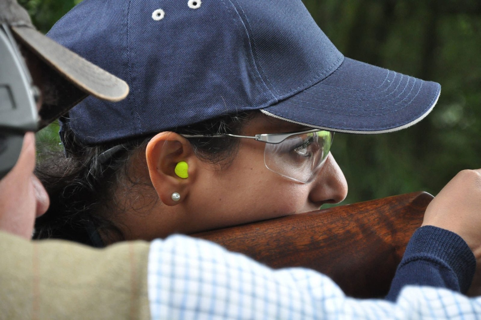 closeup of sighting a shot while clay pigeon shooting at Lady's Wood Shooting School
