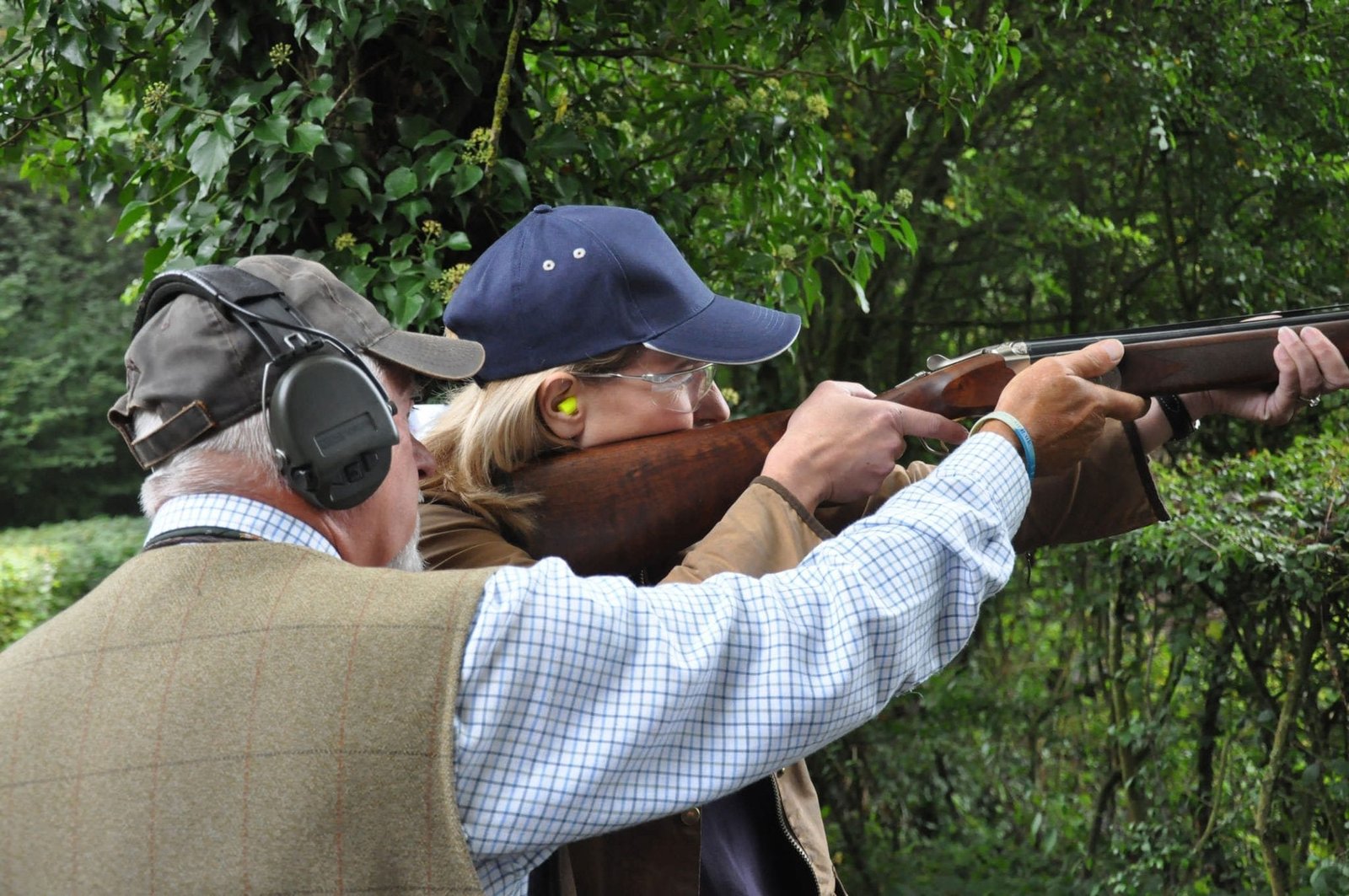 Guided instruction while clay pigeon shooting at Lady's Wood Shooting School