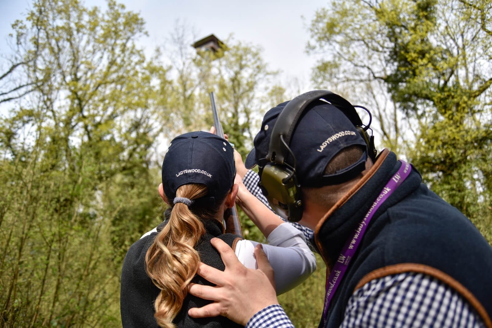 Shooting instruction while clay pigeon shooting at Lady's Wood Shooting School