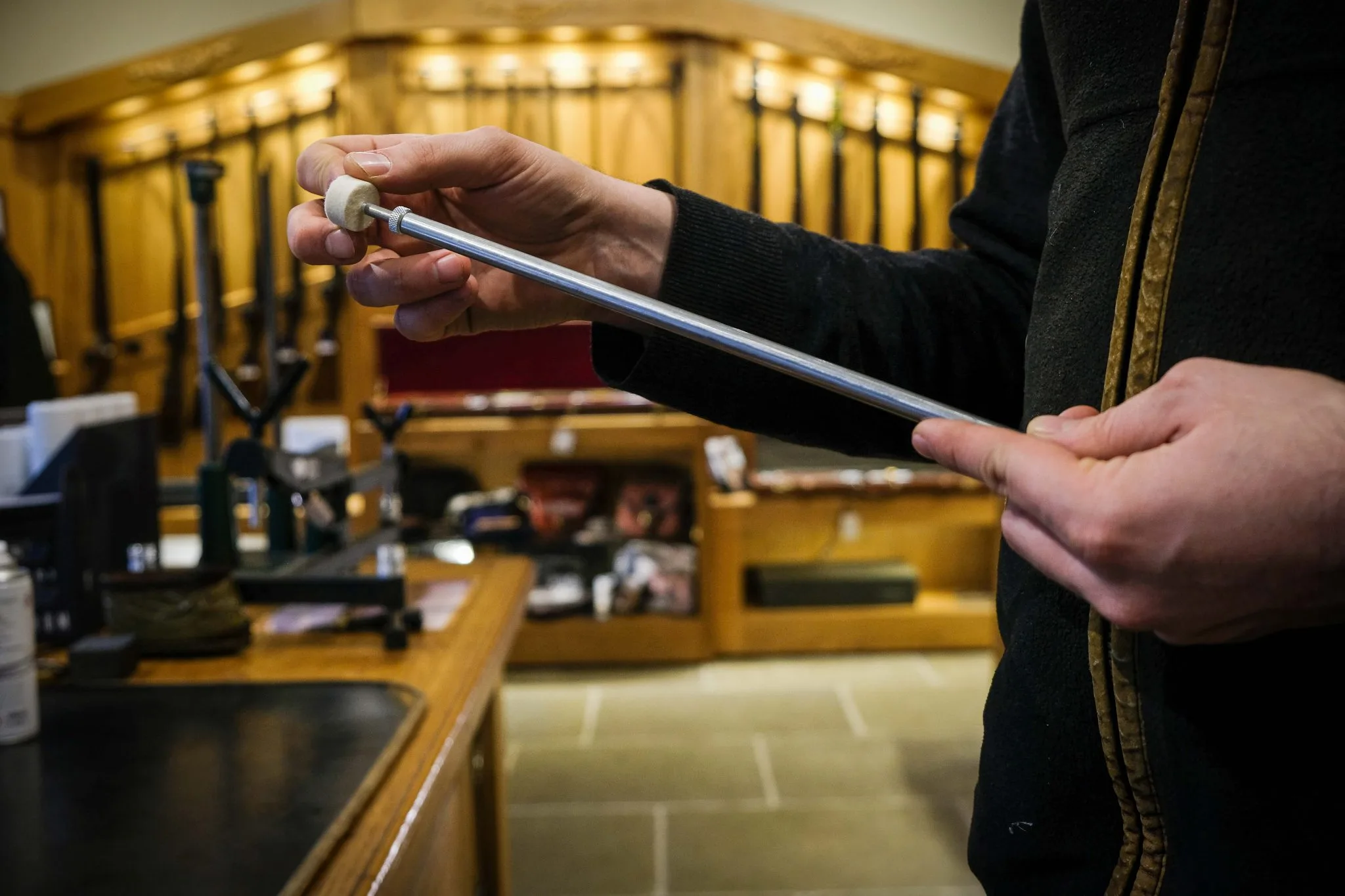 A member of the Sportarm at Lady's Wood team shows us how to clean a shotgun 