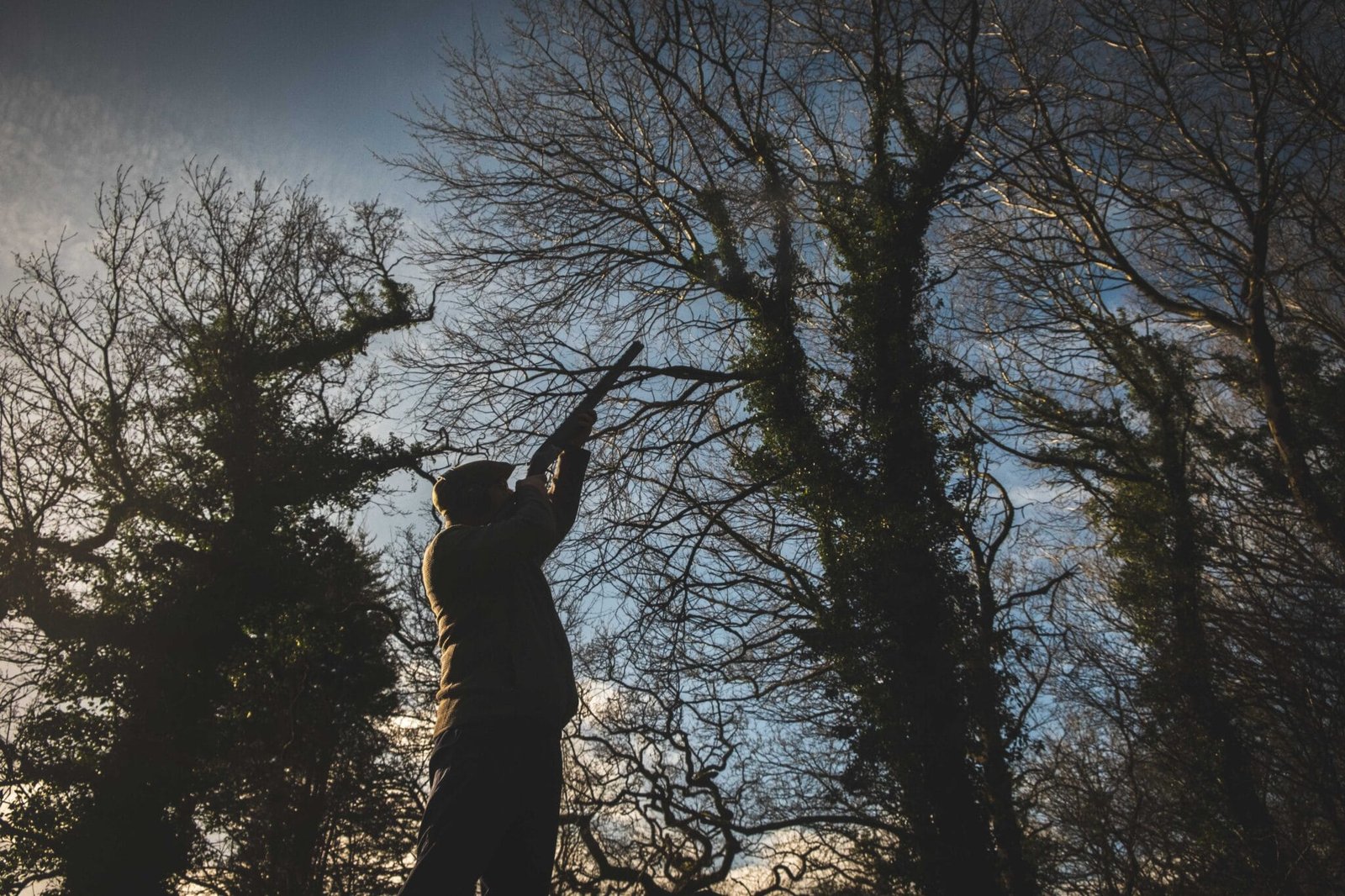 Man shooting shotgun at Lady's Wood Shooting School